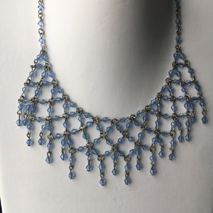 Crystal and sliver bib necklace.